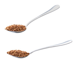 metal spoon with raw buckwheat isolated on white background.