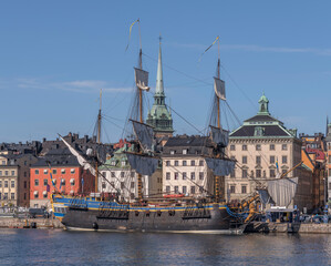 The replica of the old Indian Man G&ouml;theborg, at the pier Skeppsbron in the old town Gamla Stan, for the East India arriving to Shanghai 2023, a sunny summer day in Stockholm