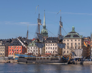The replica of the old Indian Man Götheborg, at the pier Skeppsbron in the old town Gamla Stan,...