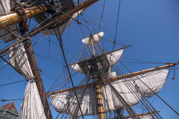 Fore mast with sails on the replica of the old Indian Man Götheborg, at the old town Gamla Stan, for the East India arriving to Shanghai 2023, a sunny summer day in Stockholm