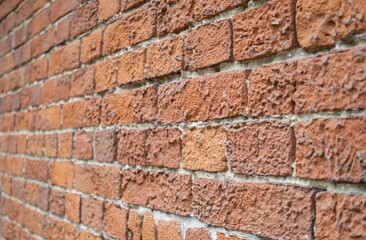 A red brick wall background side view