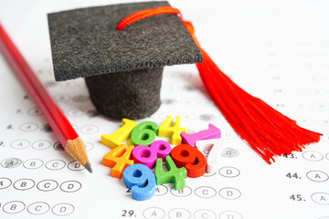 Math number with graduation gap hat on answer sheet test choice for learning Mathematic, education math concept.