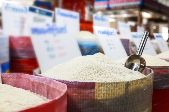 White kernel fragrant rice in the sack,Raw grain,Khao Hom Mali Jasmine Husked in the market or department store,Milled or Parboiled rice,Thai aromatic rice,dry food,diet,nutrition,healthy food concept
