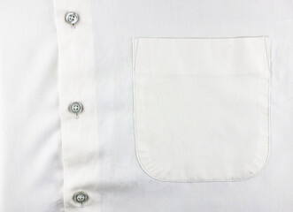 White shirt and pocket close-up. Men's shirt with a pocket, buttoned up.