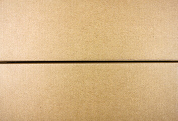 Fototapeta premium Cardboard boxes texture. Cardboard boxes background. Light cardboard boxes, packaging.Cardboard texture.Cardboard material.Paper cardboard brown light design.