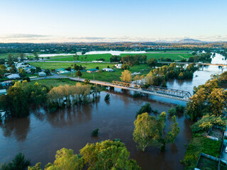 Bridges into town over flooded river in Hunter Valley