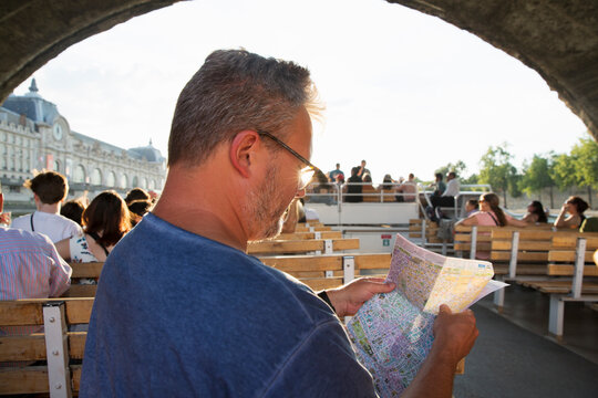 Mid adult man on tour boat on River Seine Paris France