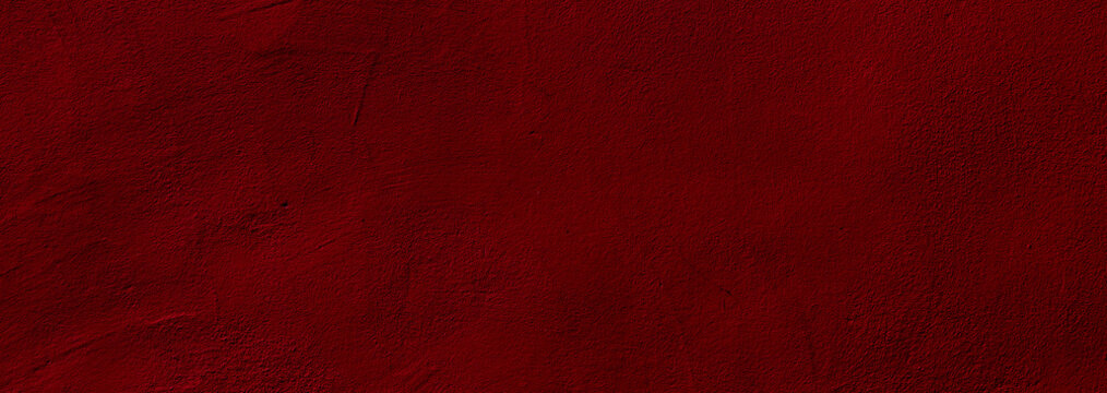 Crimson red colored wide panorama wall background with textures of different shades of crimson red