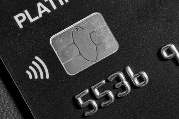 Close-up shot of a debit or credit card with a chip.