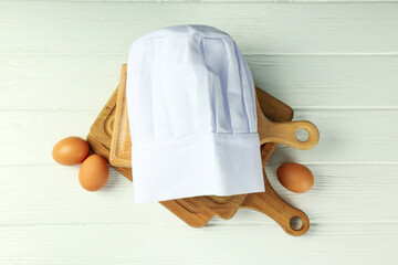 Concept of cooking food with chef hat, top view