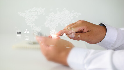 Businessman people touch Virtual screen to scan fingerprints, data management concepts, big data, business processes, automated operations, various storage systems, cloud computing.