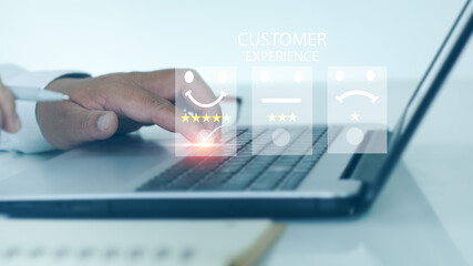 Customer Service Assessment Concept. A businessperson evaluates satisfaction, presses a smiley face to show emoticons on a virtual screen, a survey, or customer satisfaction research