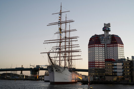 Tall ship in sea by Lilla Bommen at sunset in Gothenburg Sweden