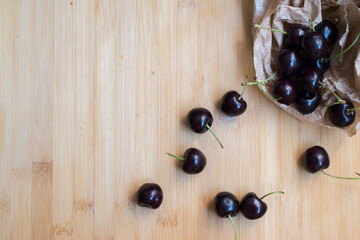 Cherries on wooden background
