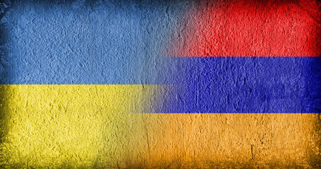 Ukrainian and Armenian flag on concrete