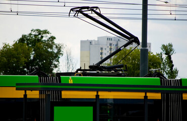 Pantograph on the tramway carriage roof top.