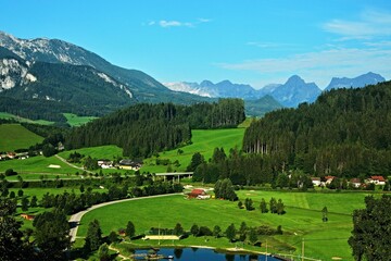 Austrian Alps - view of the Totes Gebirge mountains and the natural swimming pool in Edlbach in the Windischgarsten area