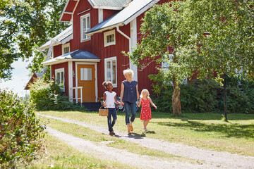 Family walking on driveway