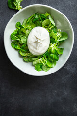 green salad buratta leaves mix fresh healthy meal food snack on the table copy space food background 