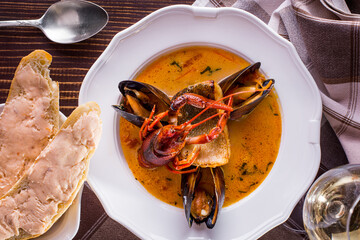 Soup with crayfish, mussels and fish