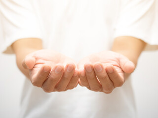 Closeup man hands skin focus finger giving hope