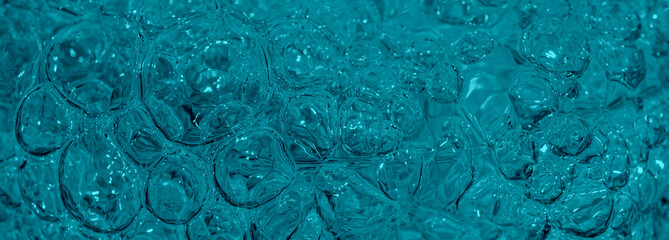 Close up of water bubbles in turquoise color.
