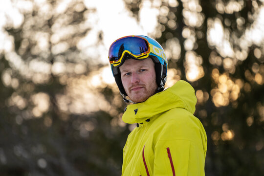 Young man in ski goggles and helmet