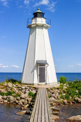 Fototapeta na wymiar Old wooden lighthouse at lake Vattern in sweden
