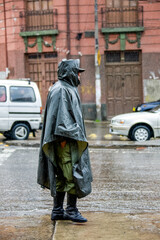 Policeman in raincoat on the streets of La paz, Bolivia.