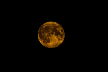 full moon in the night sky, Super Moon, with craters in the black sky, isolated