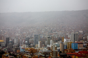 Cityscape of La Paz in Bolivia, city in smog
