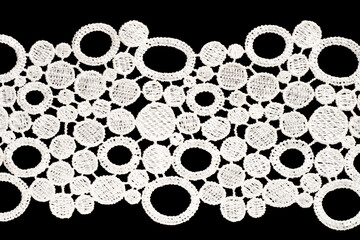 White lace with shape oval on black background isolated horizontally