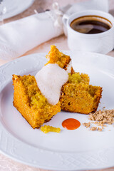Honey cake with milk froth and caramel