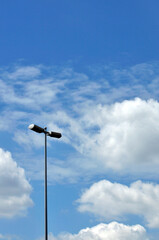 street light against blue sky