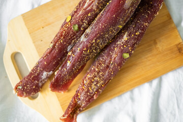 Beef and pork fresh meat with salt and spices on the table. Delicious tasty meat food 