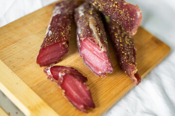 Beef and pork fresh meat with salt and spices on the table. Delicious tasty meat food 