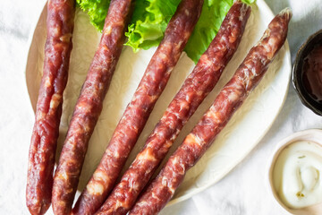 Beef and pork fresh meat with salt and spices on the table. Delicious tasty meat food 