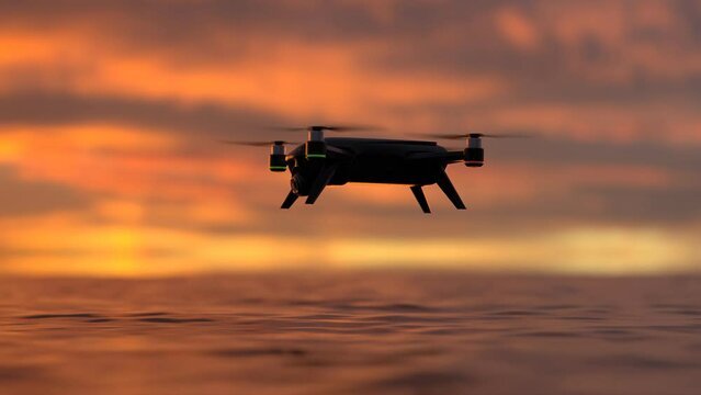 Drone silhouette above the water with beautiful sunset in the background. 4KHD