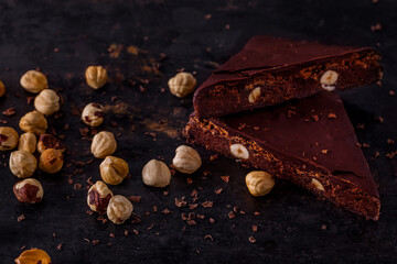 Fototapeta na wymiar Chocolate brownie with hazelnuts