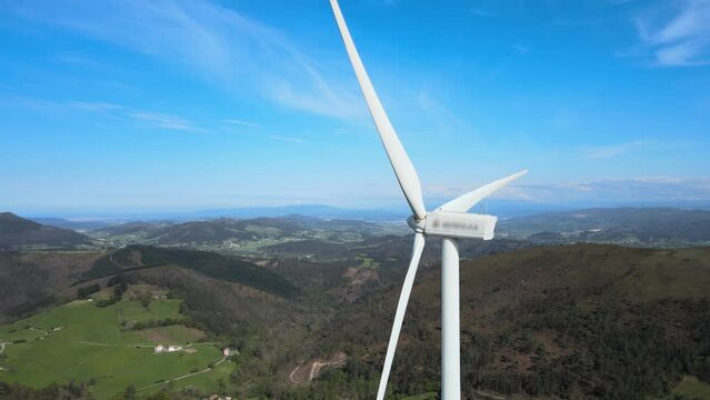 Aerial view of windmills in summer forest in Spain. Wind turbines for electric power with clean and Renewable Energy video