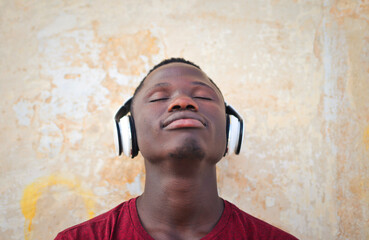 portrait of young man while listening to music