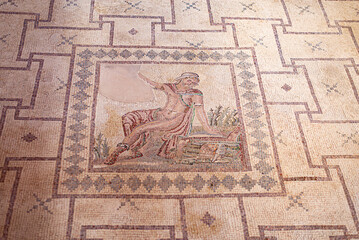 Ancient Greek floor mosaic in archaeologic park Kato Paphos, Cyprus.