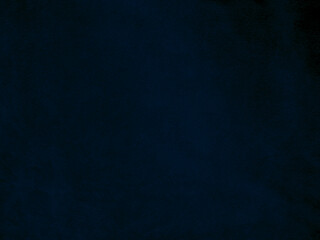Dark blue old velvet fabric texture used as background. Empty blue fabric background of soft and smooth textile material. There is space for text..