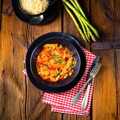 colorful turkey fricassee with asparagus and paprika