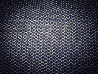 Material black color background. Pattern of black mesh fabric.The surface of net with holes like honeycomb.