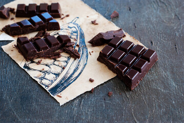 Homemade dark chocolate on the dark background