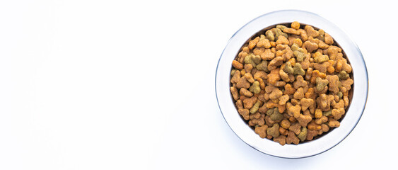 Round metal bowl for pets with dry food. Isolated on white background. View from above. Full plate with a slide