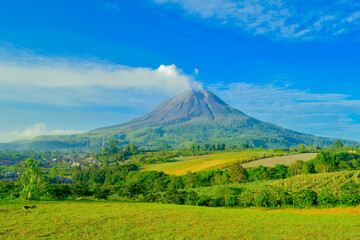 Fototapeta premium Mount Sinabung - Located in Kabanjahe, Karo Regency. This mountain is still actively emitting hot clouds until now.