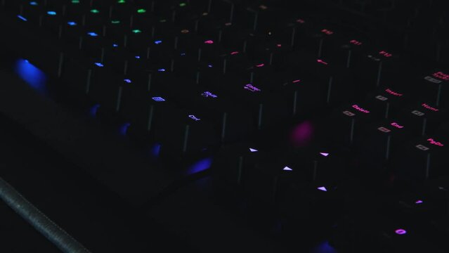 Enter Button on RGB Gaming Mechanical Keyboard. PC Computer. Close up video.