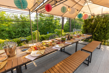 Food served outdoor on a long table